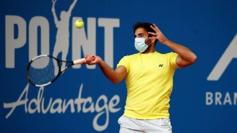 Benjamin Hassan, il primo tennista con mascherina