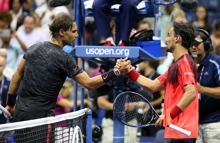 Fabio Fognini e Rafa Nadal si stringono la mano a fine match dopo la sfida degli US Open 2015