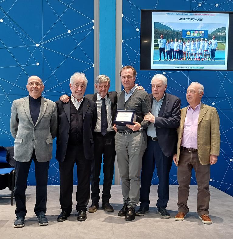 Marcello Marchioni (2° sx) accanto al presidente Brunetti